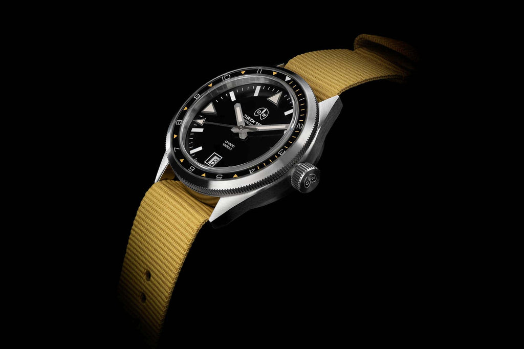 https://wornandwound.com/ollech-wajs-recreates-the-classic-caribbean-1000-diver/