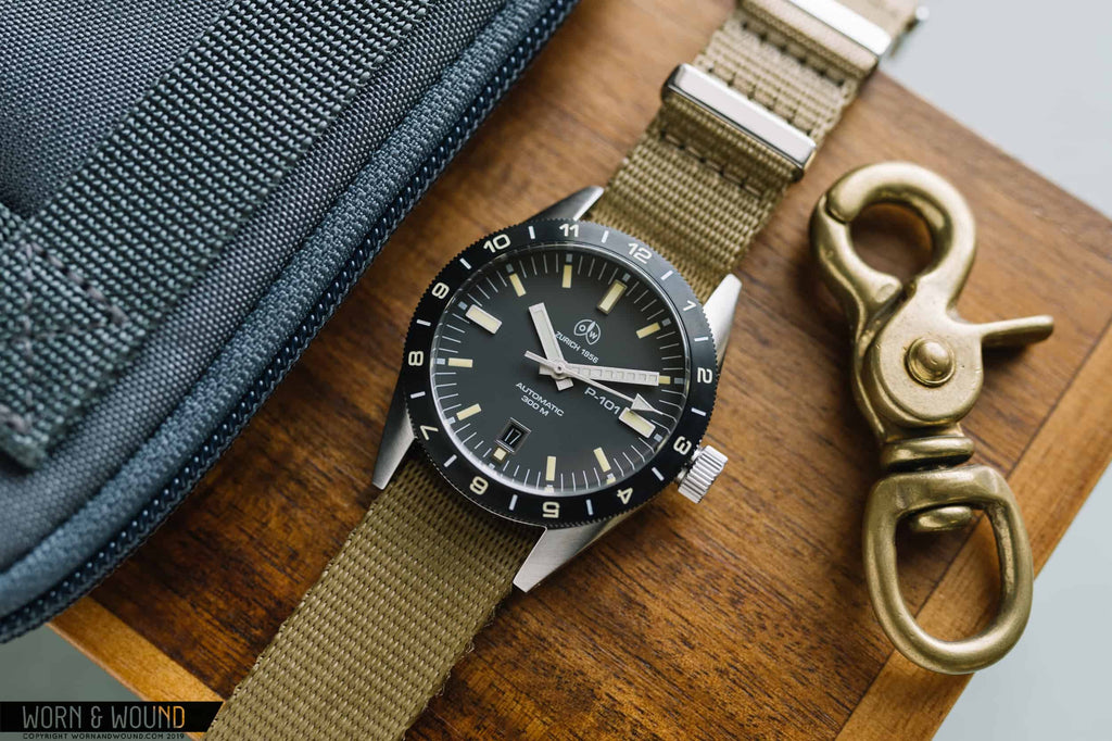 https://wornandwound.com/review/review-the-ollech-wajs-p-101/